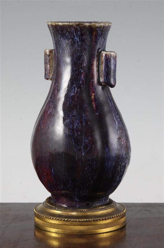 A Chinese flambe-glazed arrow vase, 18th/19th century, total height 21.7cm, faults